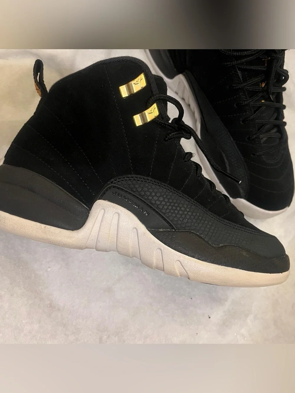 Black and White Jordan 12s